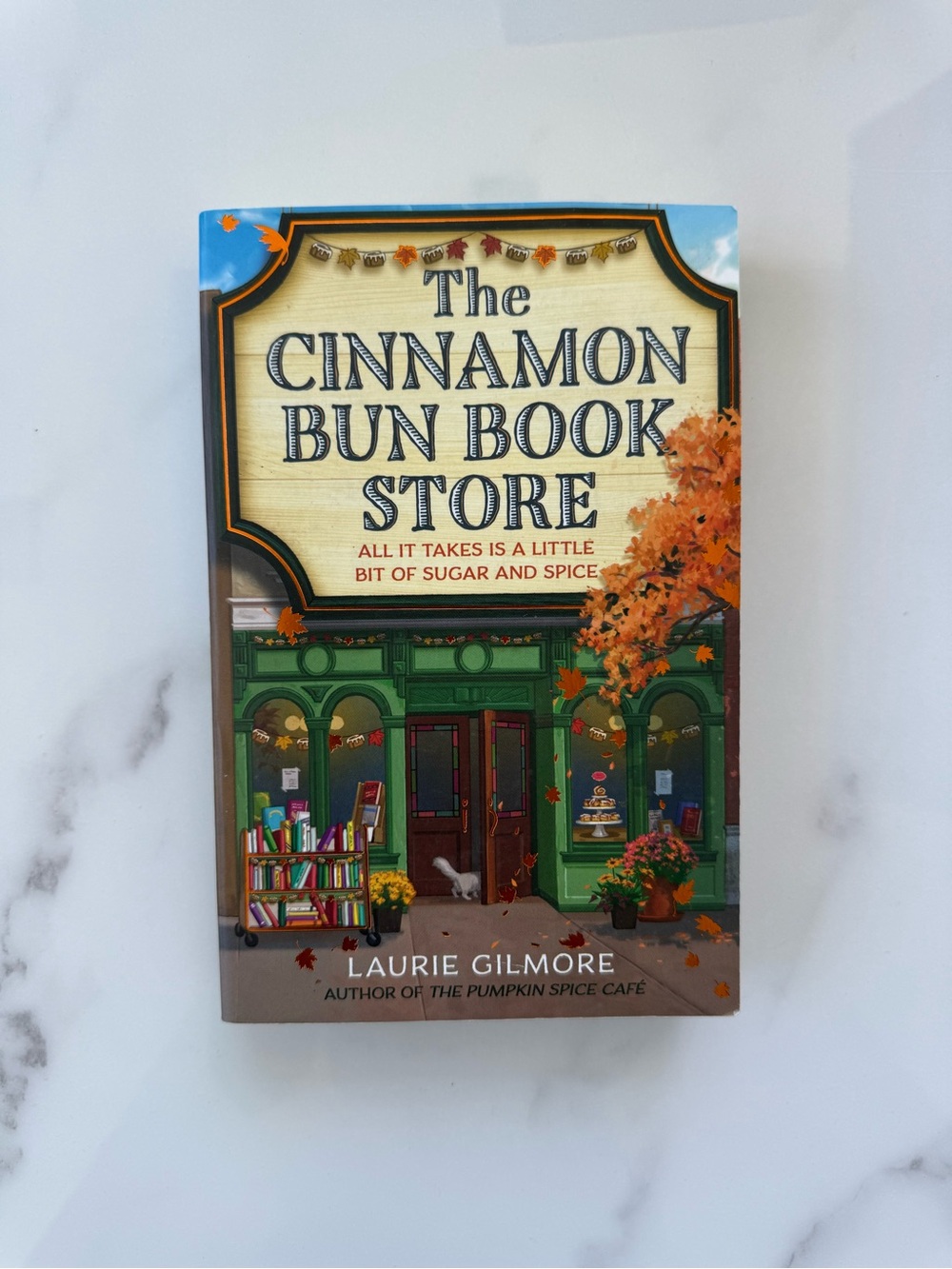 The Cinnamon Bun Book Store by — Green Cover Paperback